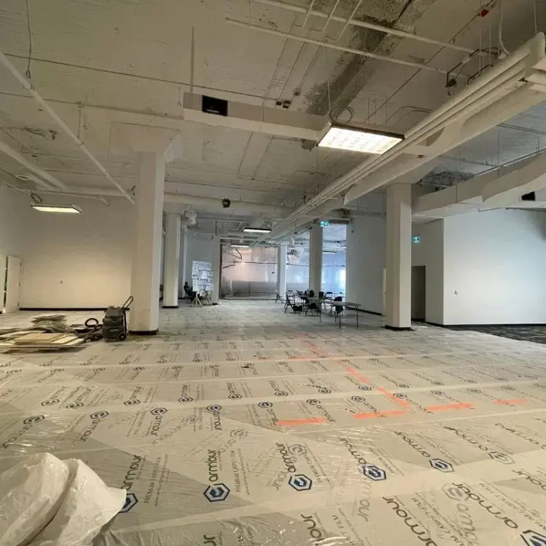 Image of Armour Premium Carpet Film on Synergy Projects jobsite for temporary surface protection blog blog by Axiom, supplier to Canada/ North America construction professionals