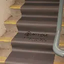 Armour-Neoprene-Floor-Runner-In-Use-On-Stairs-2.webp